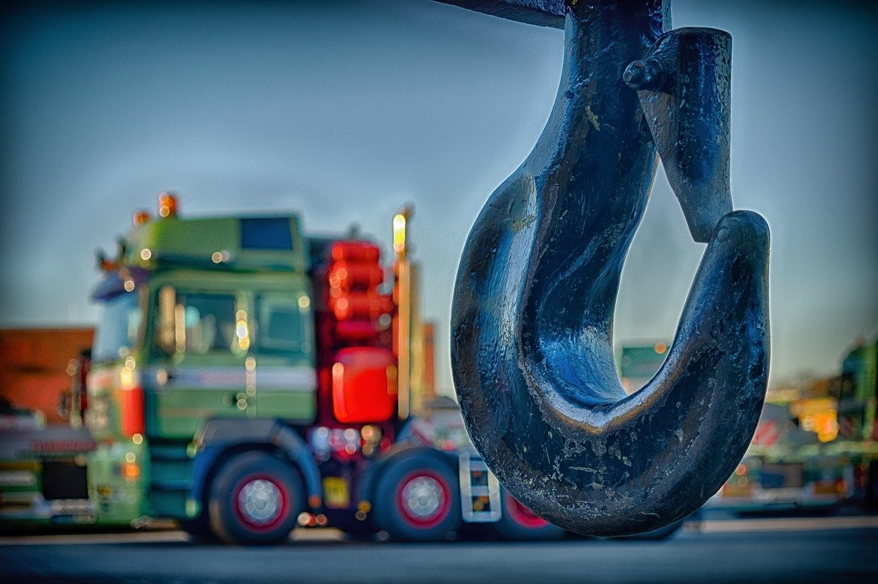 How to ensure safety during transport of heavy equipment